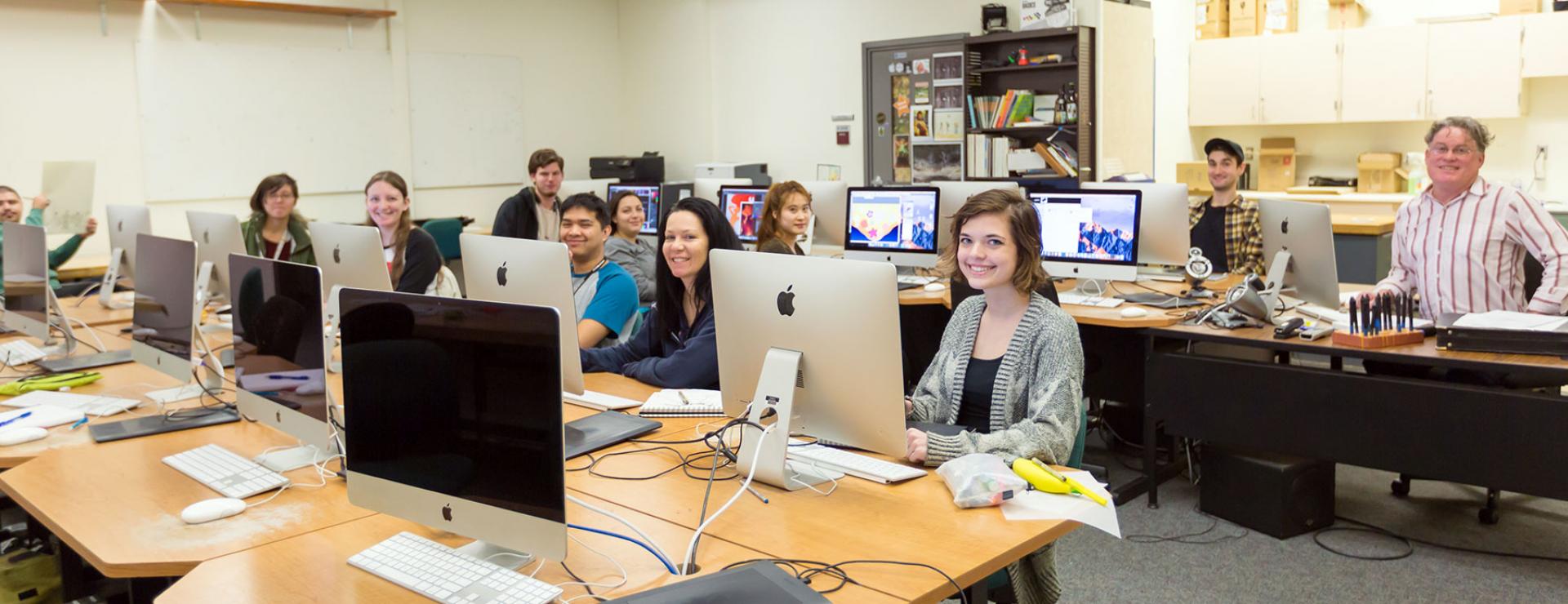 Students using computers in Design class.