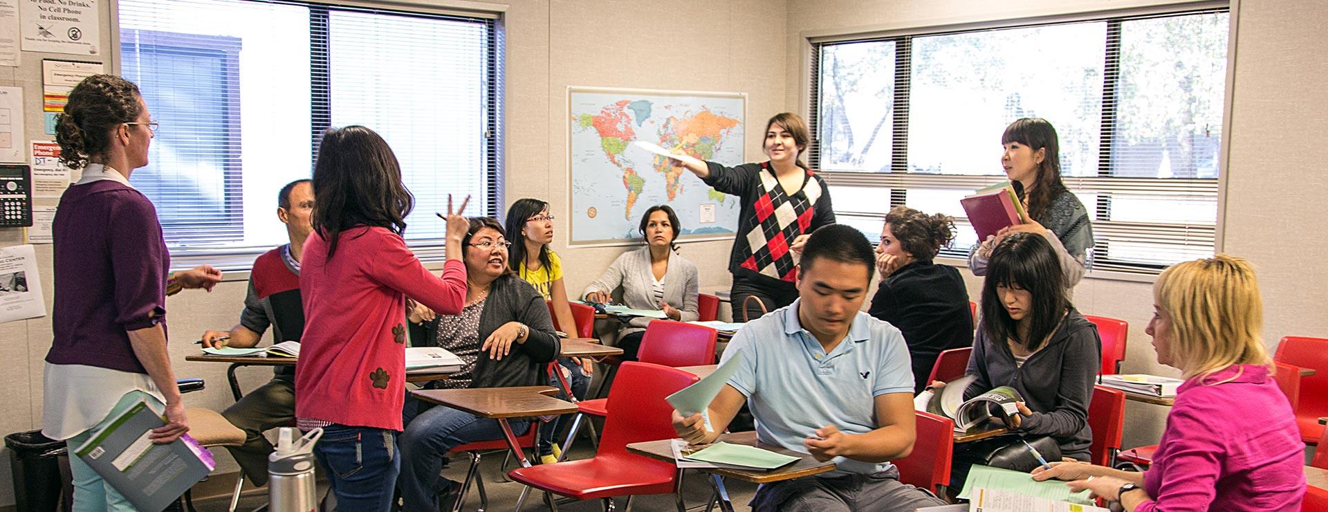 ESL students interacting with ESL instructor