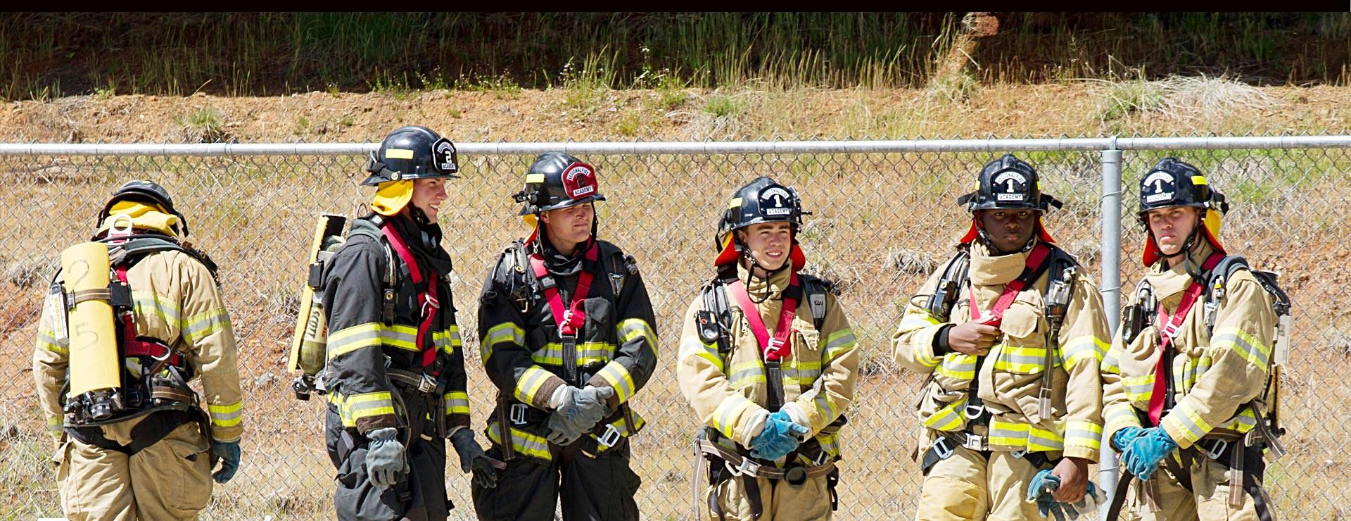 Firefighting students dressed and ready to fight fires