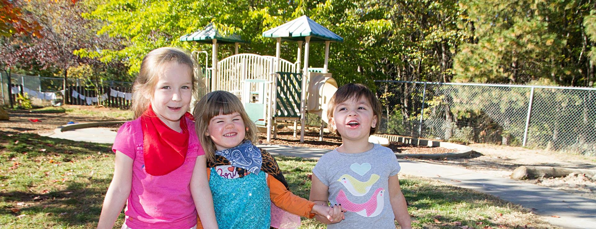 Preschool children playing on playground