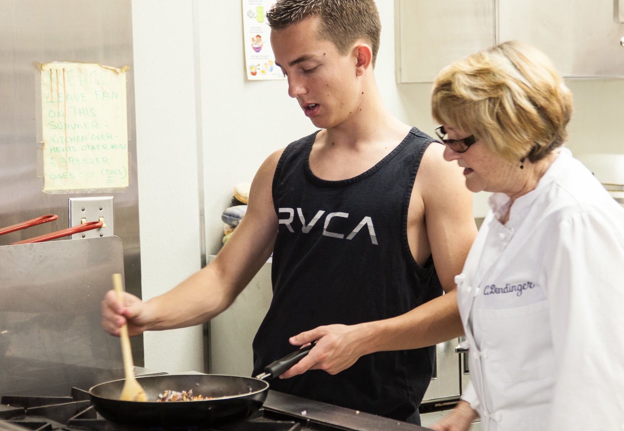 Student Cooking With Professor In Sierra College Kitchen