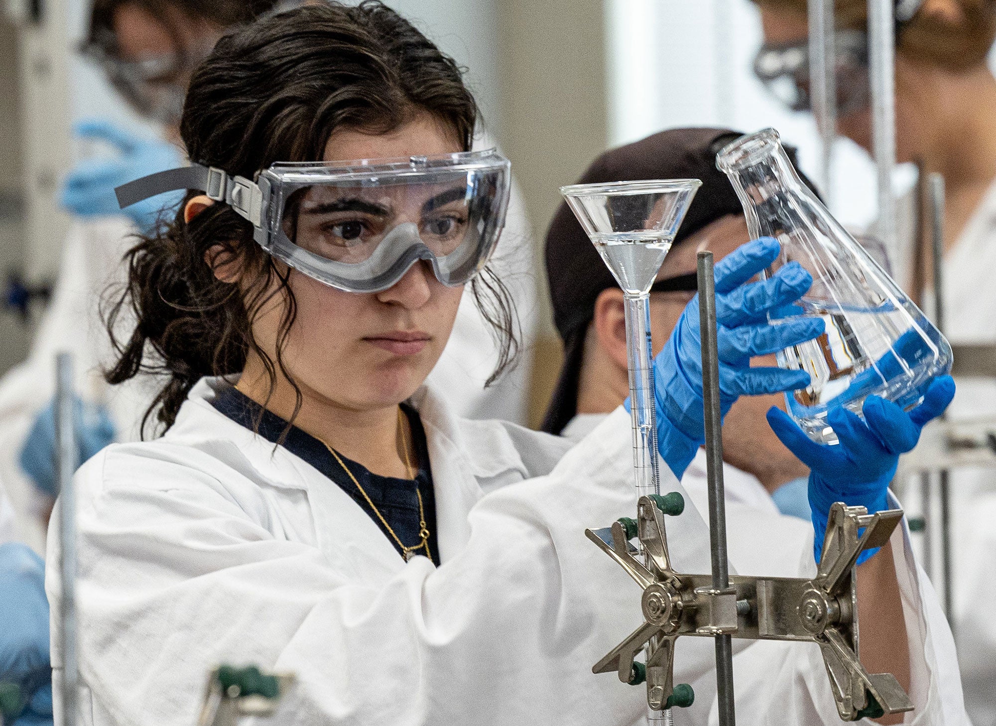 Student conducting chemistry experiment