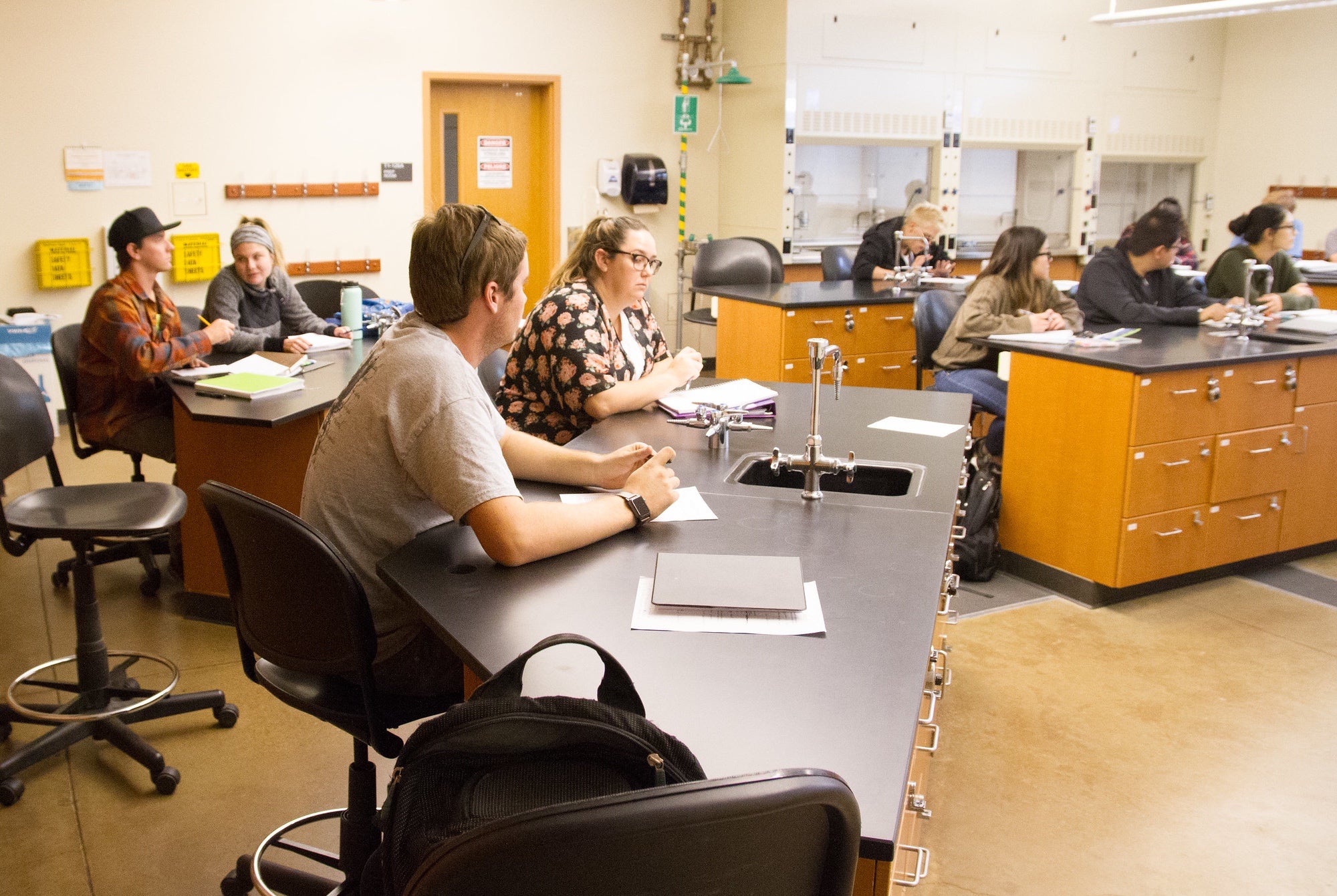 Students at desks in science classroom.