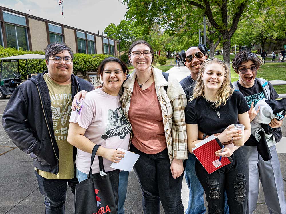 Group photo of students on campus quad