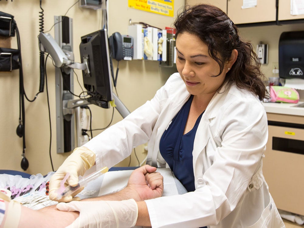 Physician is helping the patient in the health center