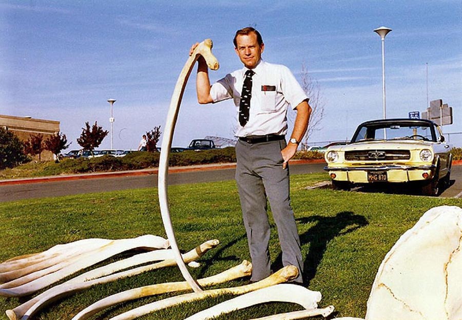 Charles Dailey holding a whale bone 