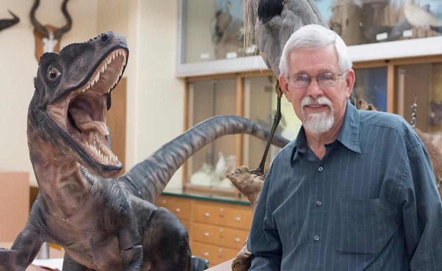 Dick Hilton with dinosaur model