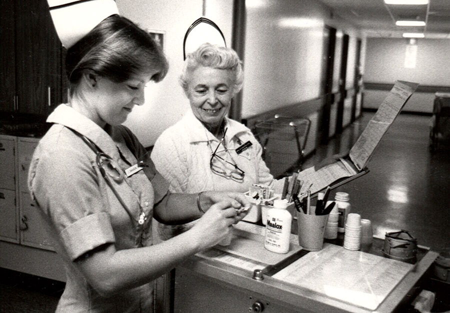 Marge Sanchez teaching a nursing student