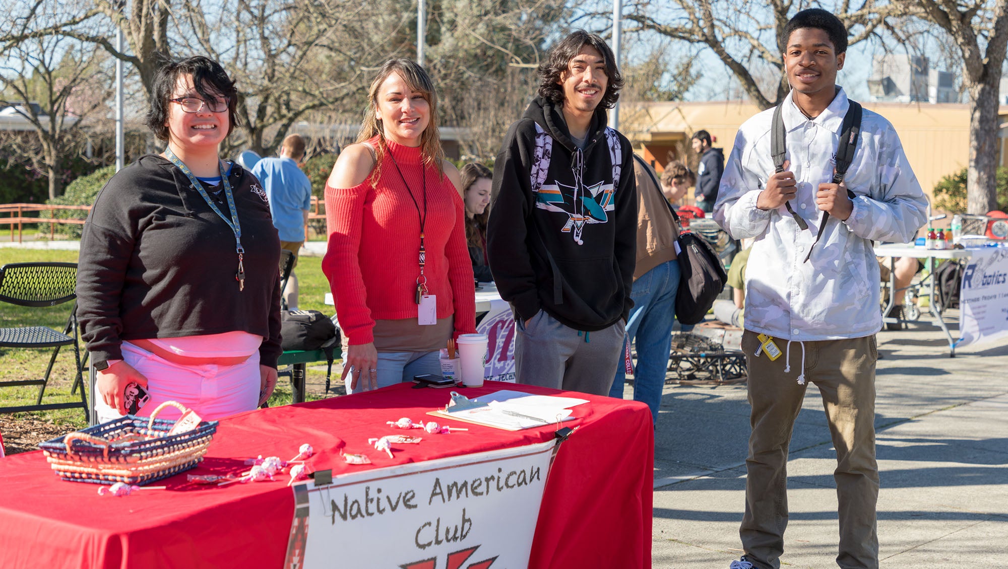 Four students at the Native American Club booth during Sierra College's Wolverine Week