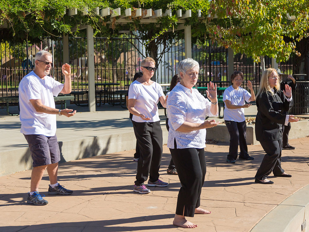 Students participate in Tai Chi community learning class