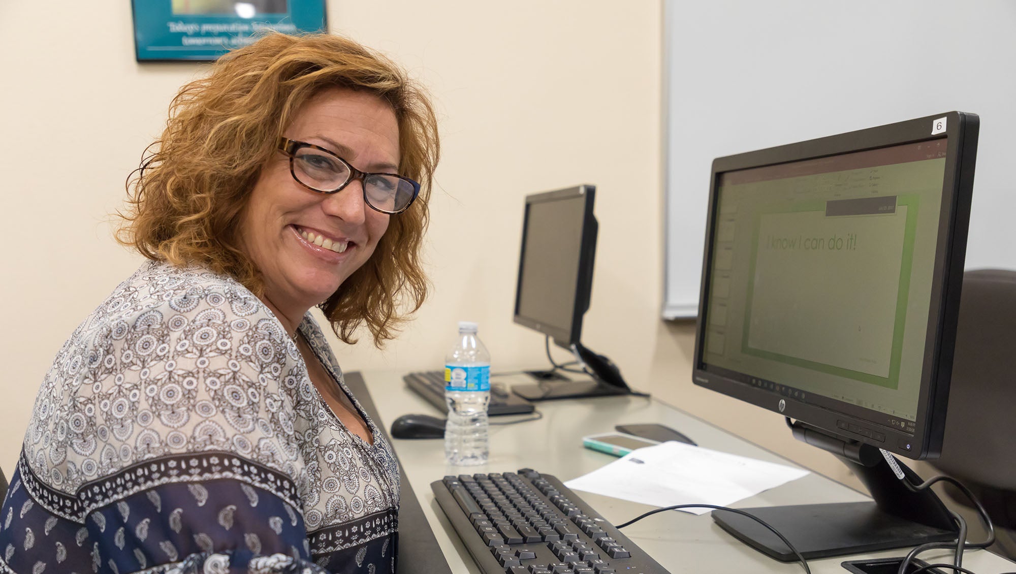 Older female student at the computer