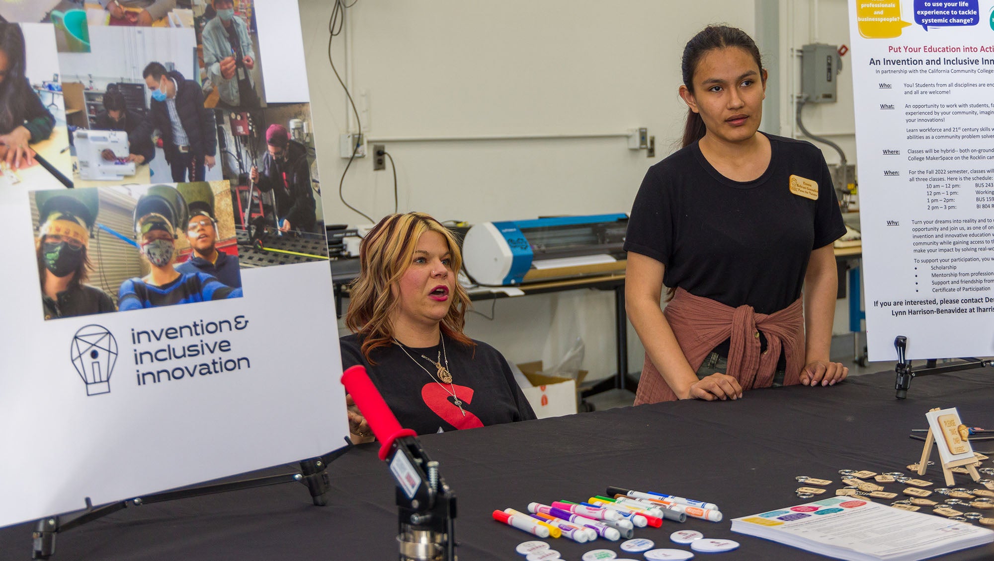 Two students at the I3 booth at the Makerspace Grand Opening on the Sierra Rocklin campus