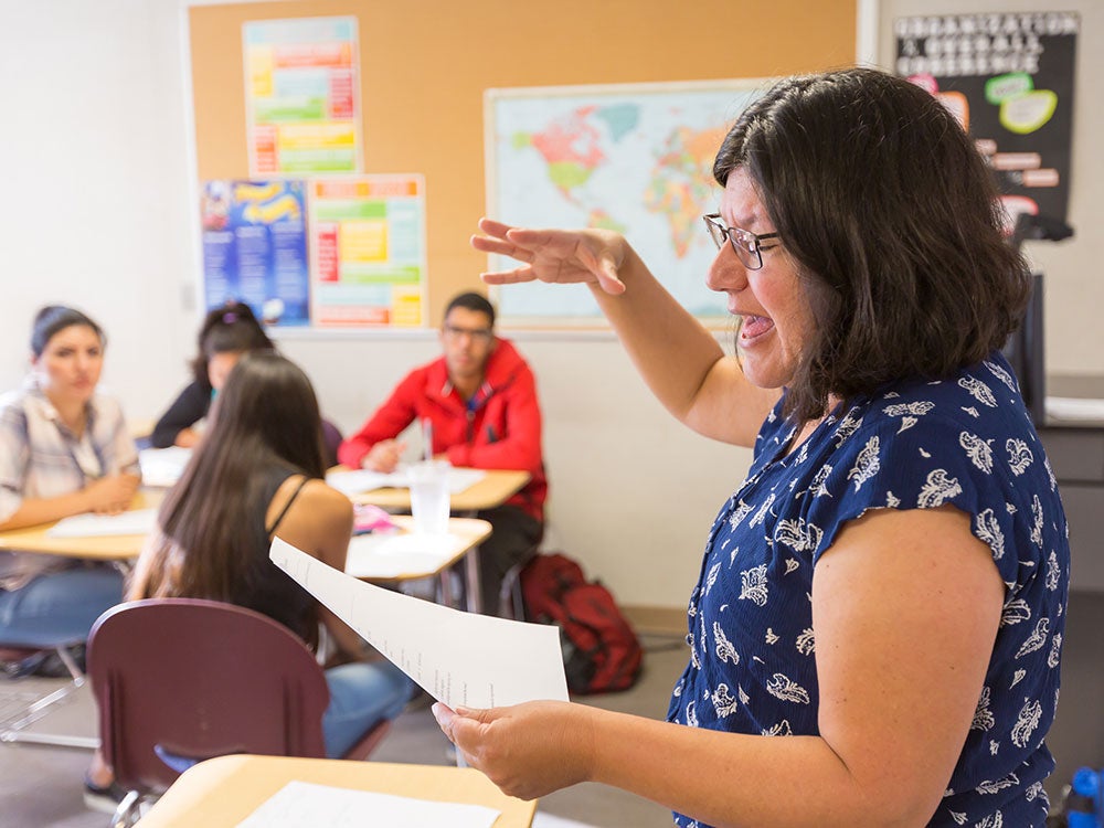 Instructor teaching students in English as a Second Language class