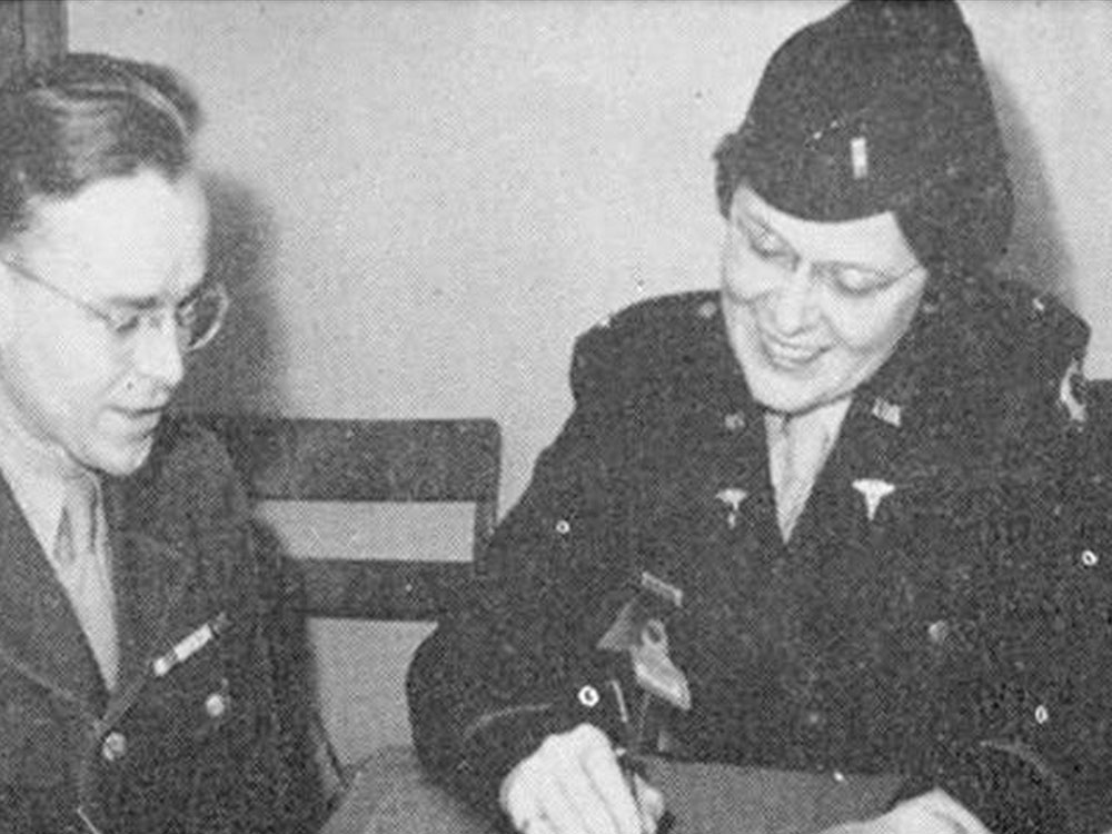 Two people in WWII uniforms at Placer College