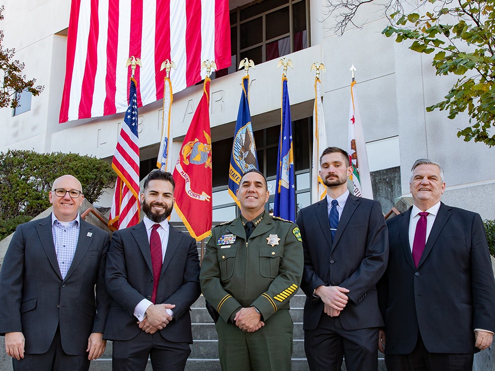 Veterans Day celebration at Sierra College featuring personnel and flags