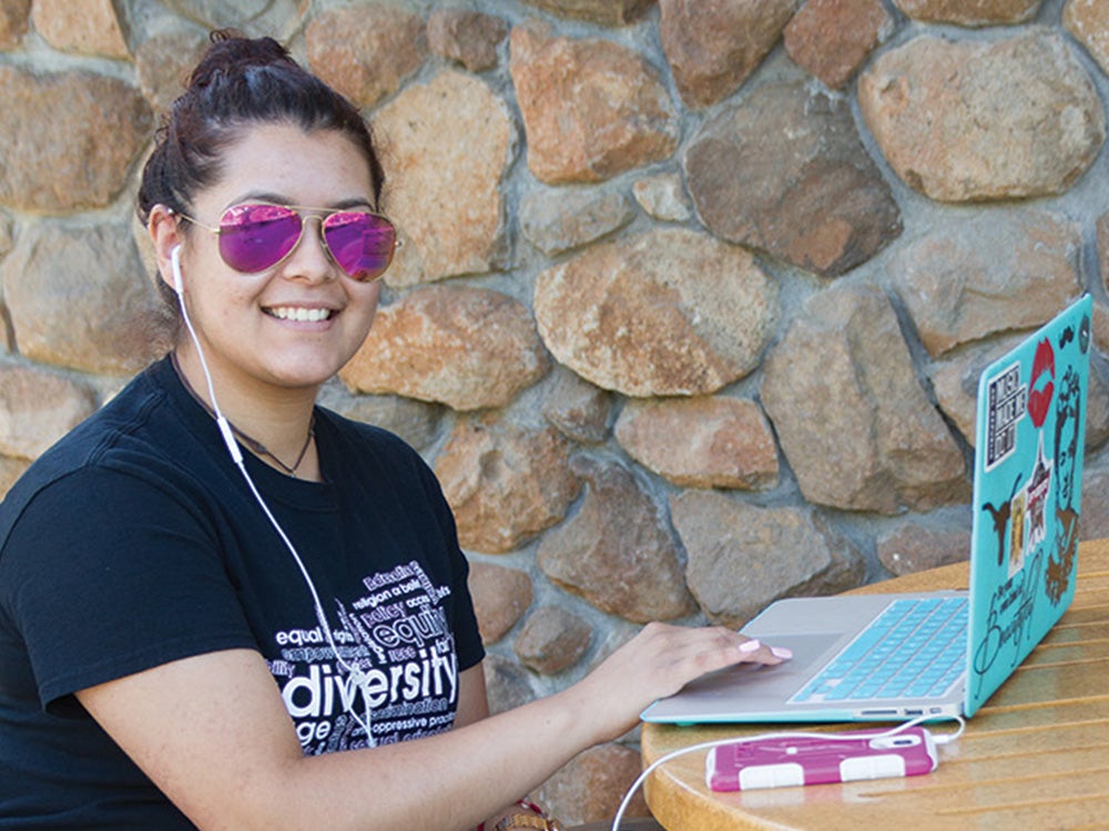 Sierra College student studying on laptop