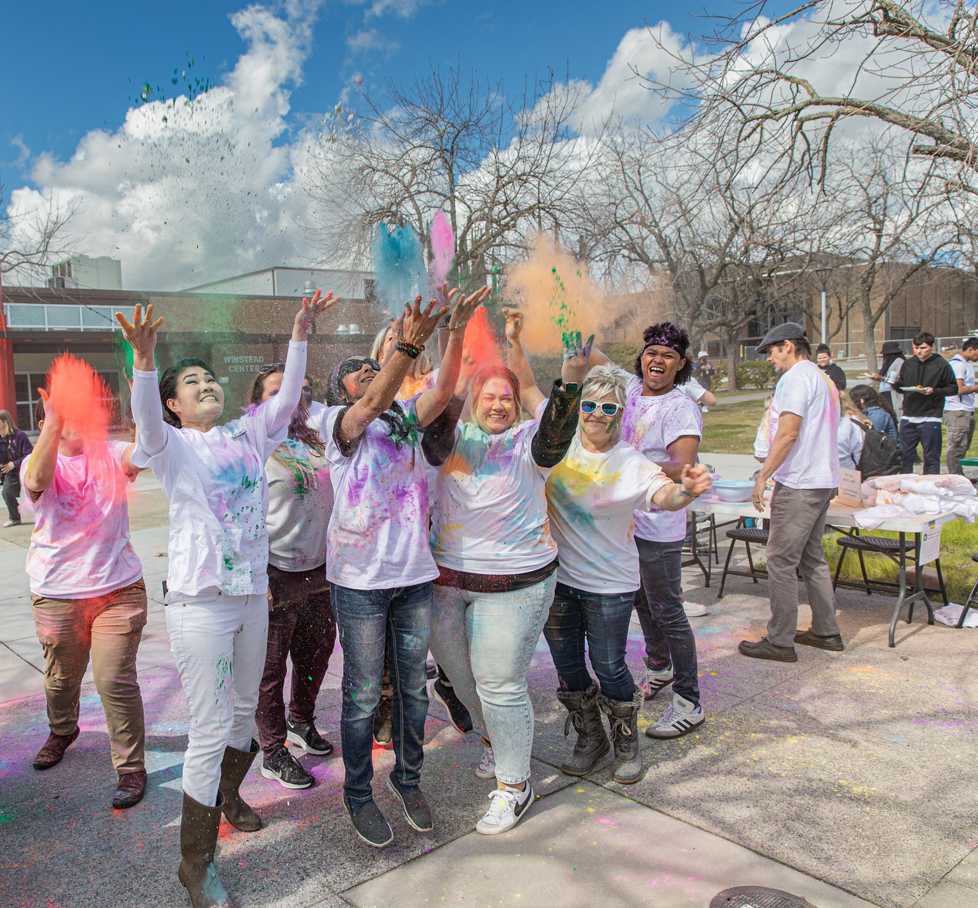 Students celebrate HOLI festival by throwing colored powder in Rocklin quad