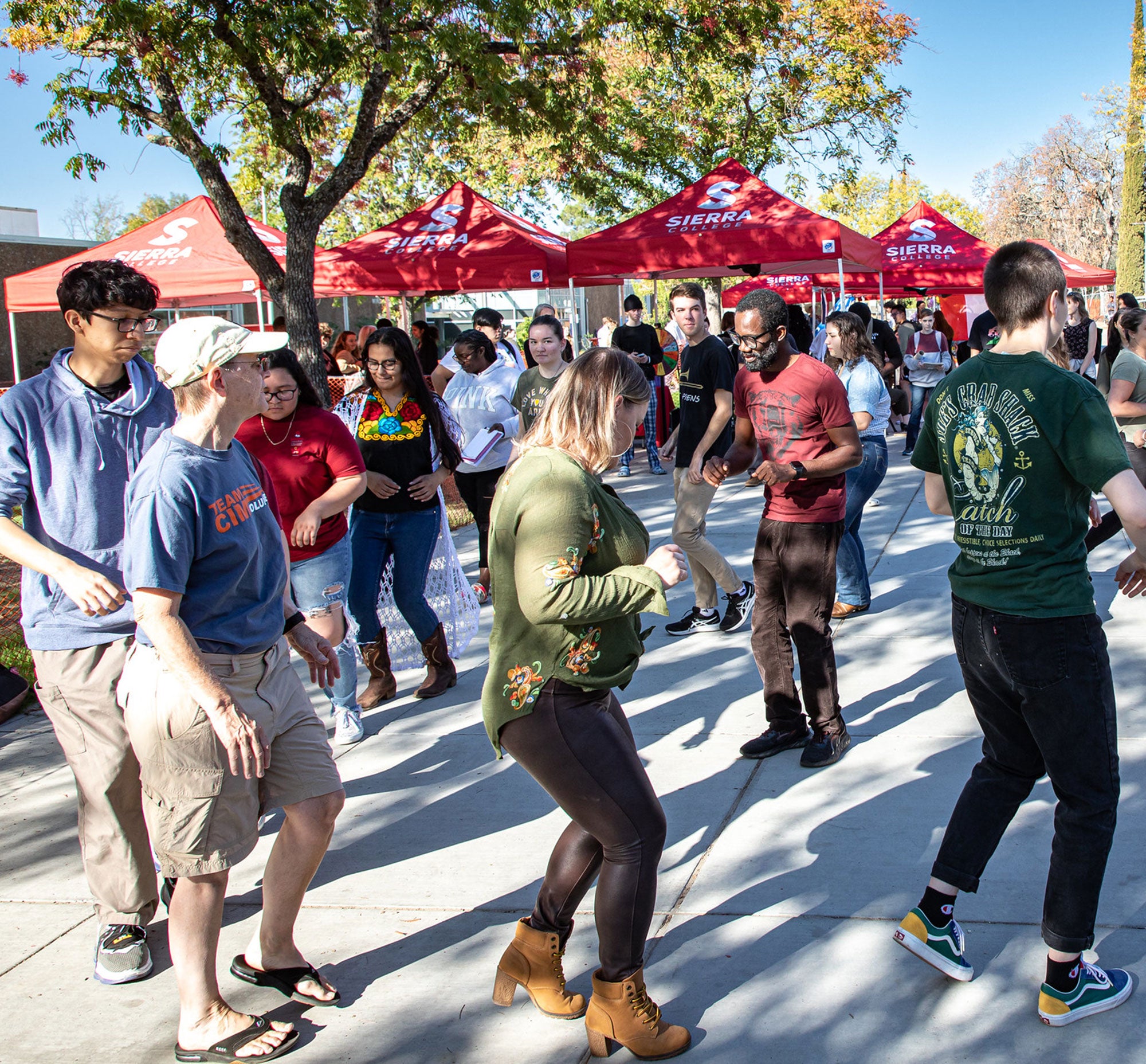 Students learn and participate in a cultural dance