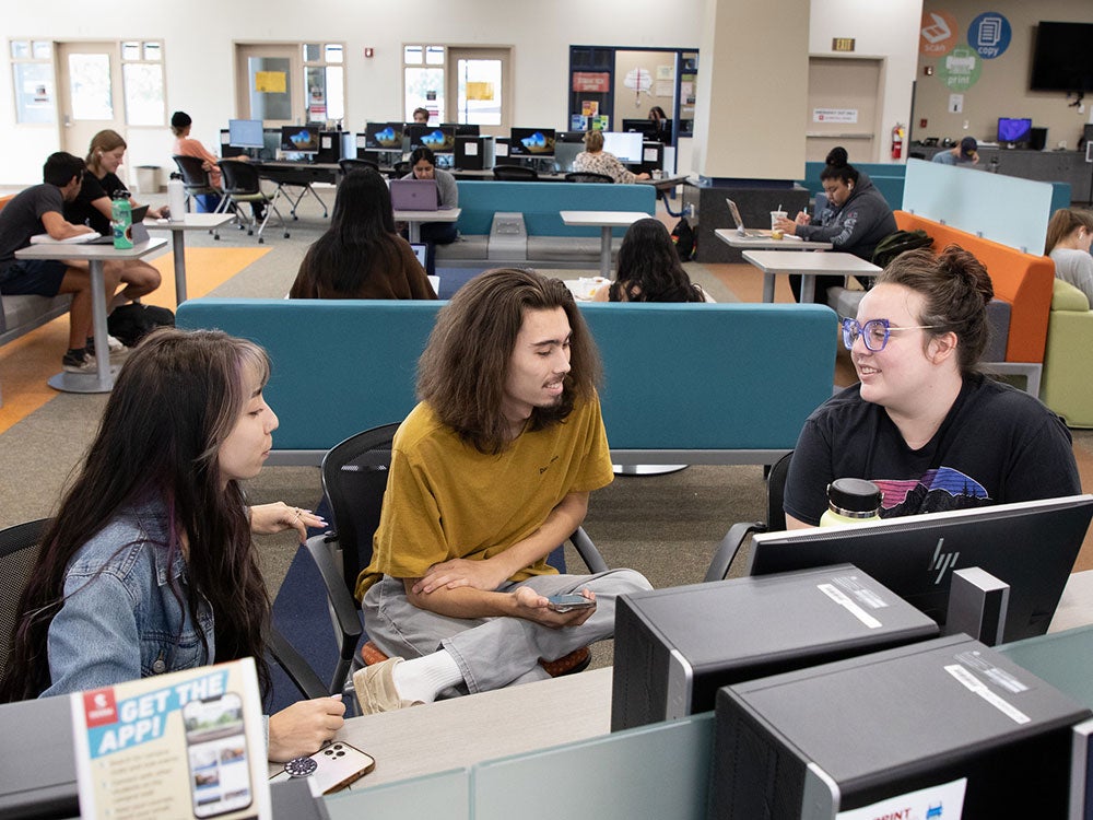 Students using computers in Student Tech Support area of Learning Resource Center (LRC) on Rocklin Campus.