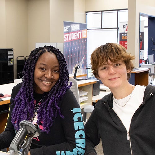 Two Sierra College employees working in Rocklin Campus Library