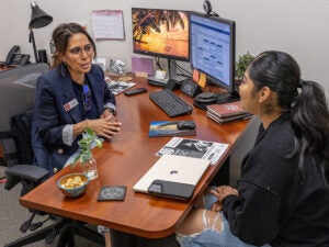 Counselor talking to a student