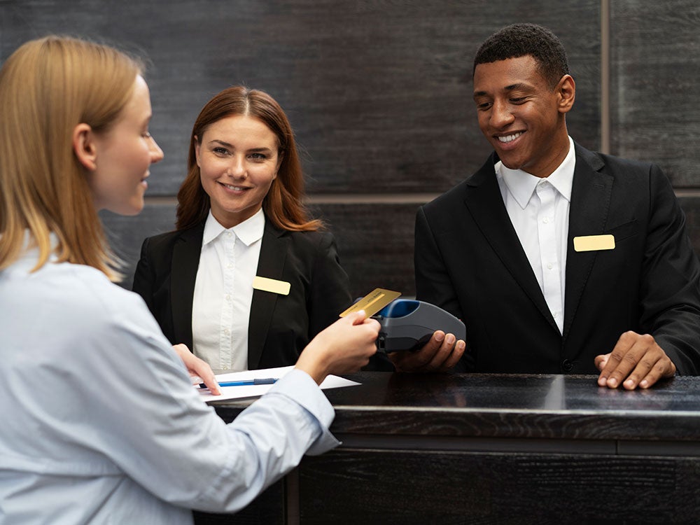 Recm Hospitality Receptionists help guest check in