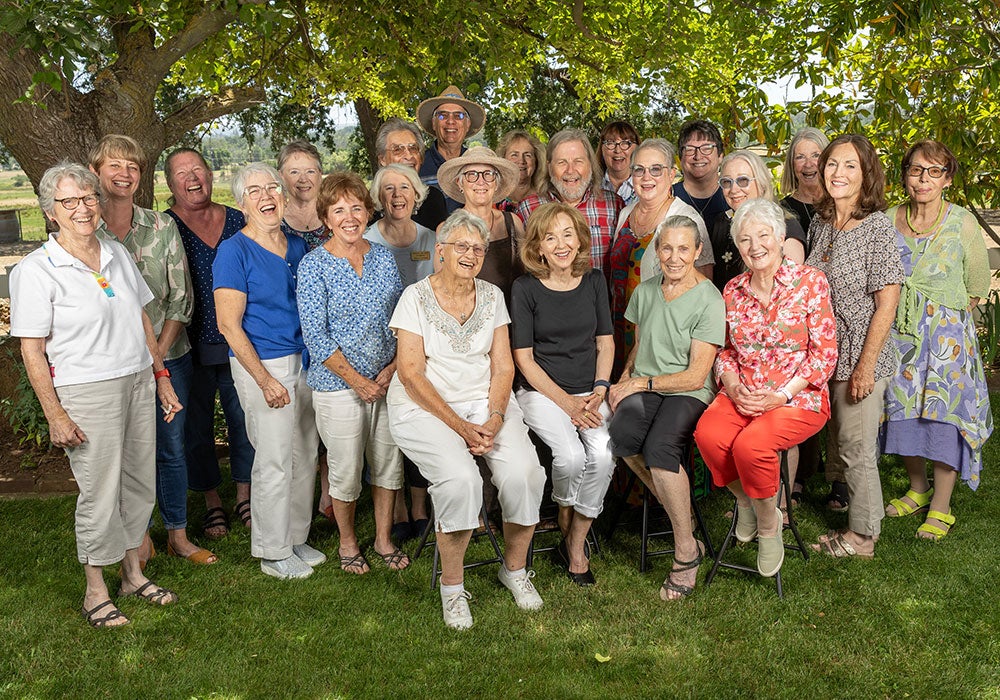 Patrons group photo at spring 2025 potluck
