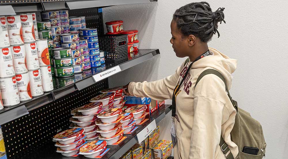 Student accessing food pantry