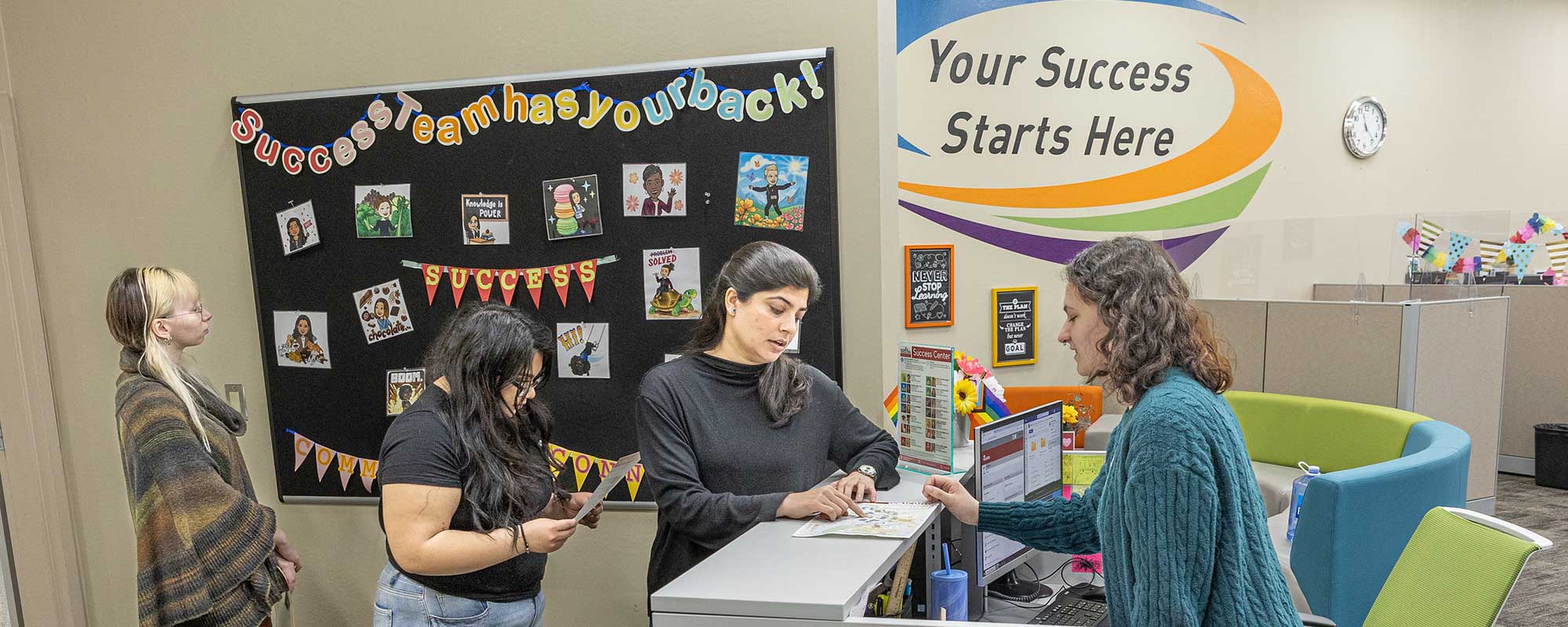 Students requesting help at the Success Center