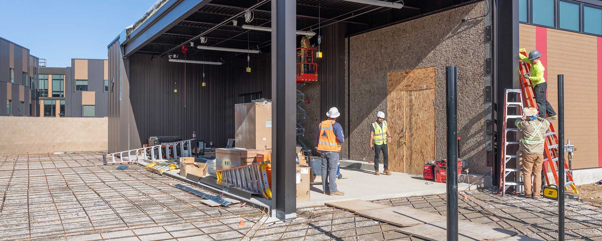 Construction workers busy at work on new ATC Building