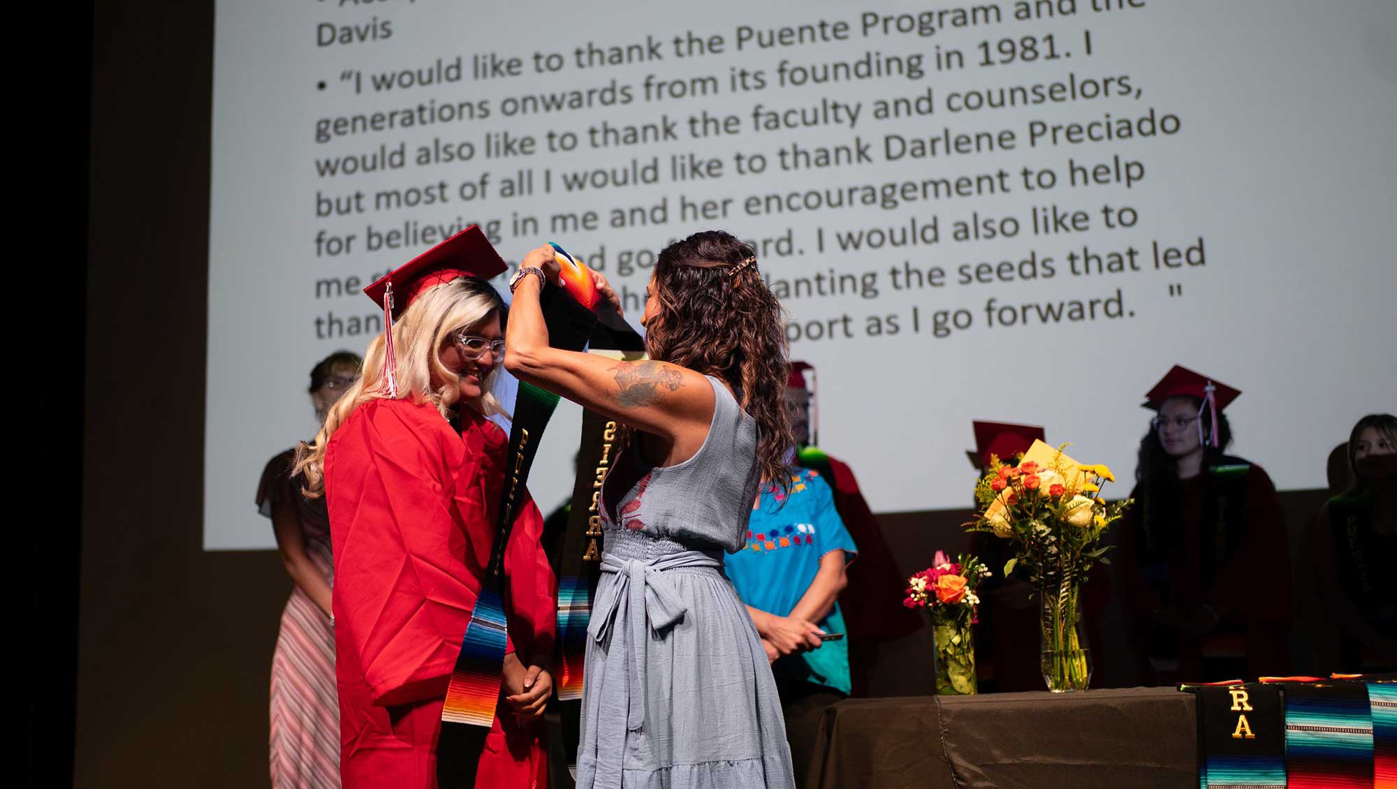 Faculty places Puente stole on student