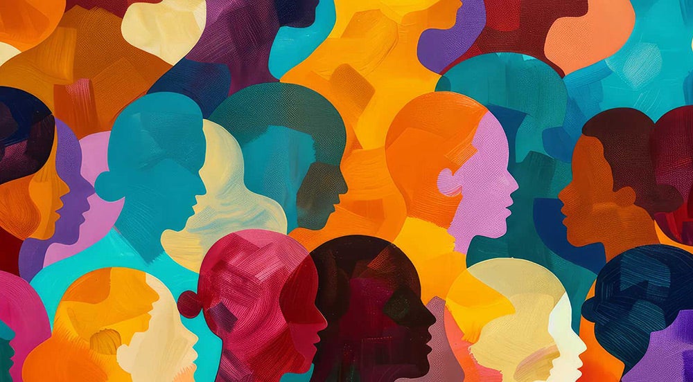 Painting of peoples' faces in different colors and shades